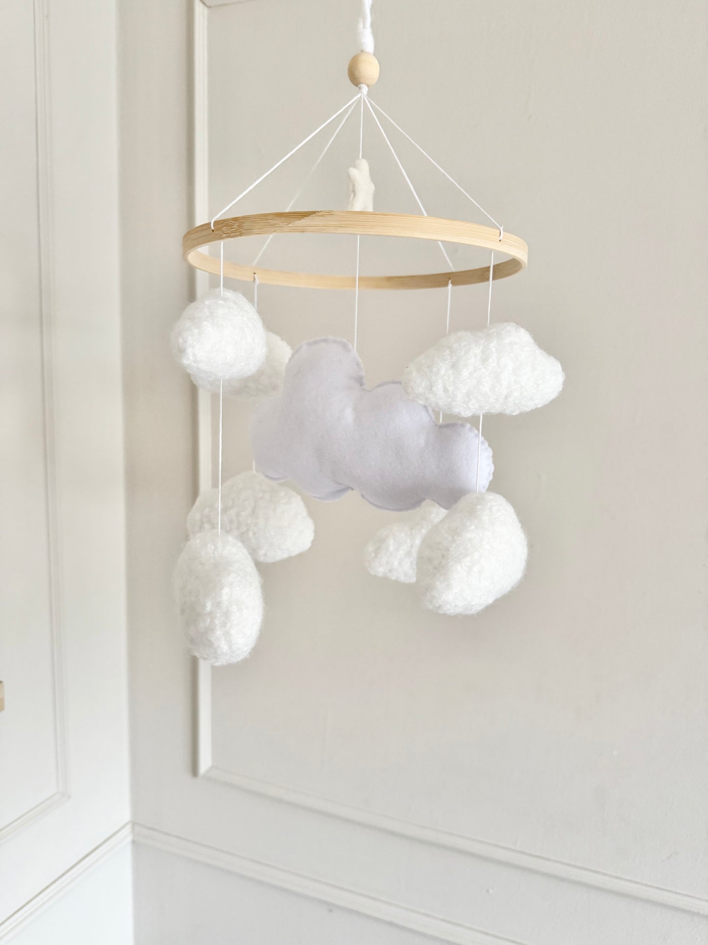 CLOUD NINE cot mobile for a neutral nursery. Handcrafted with 8 boucle clouds and 1 felt large cloud.