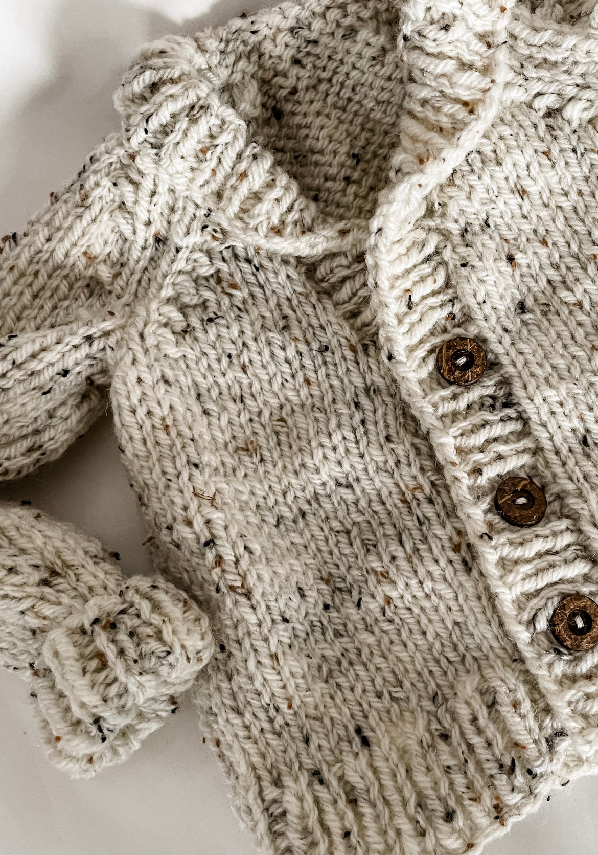 HAND KNITTED CARDIGAN- speckled baby knitwear