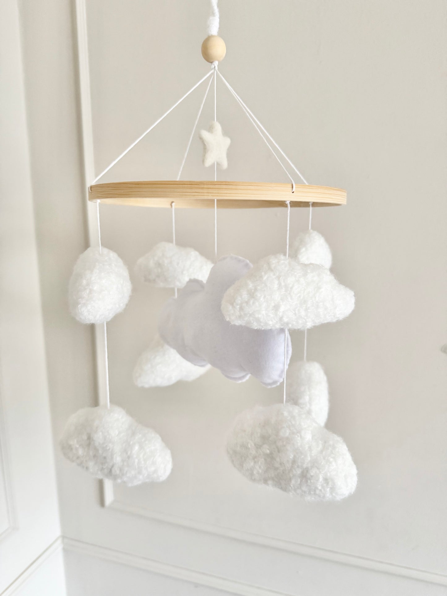 CLOUD NINE cot mobile for a neutral nursery. Handcrafted with 8 boucle clouds and 1 felt large cloud.