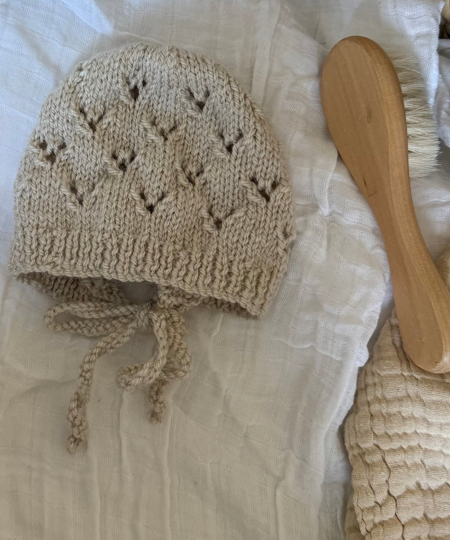 HAND KNITTED BABY BONNET
